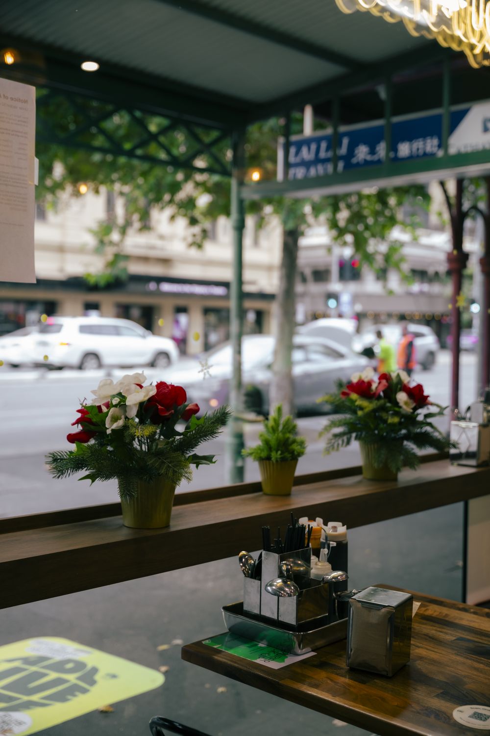 Window seats at Bà Năm looking out onto Grote Street, Adelaide